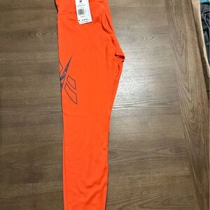Reebok orange and black leggings #activewear